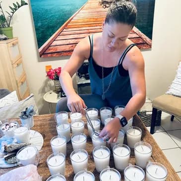Rae Can handcrafting Reiki-infused candles